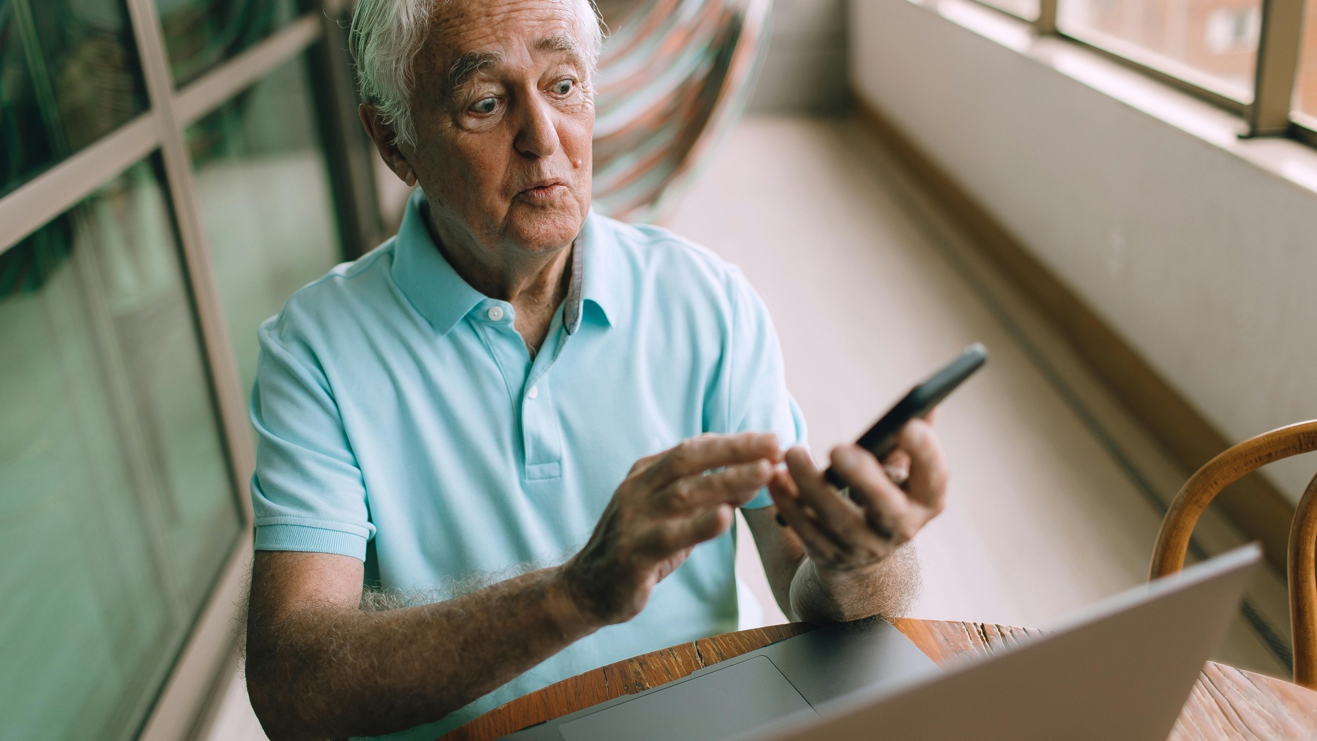 Person using smartphone looking happy and engaged